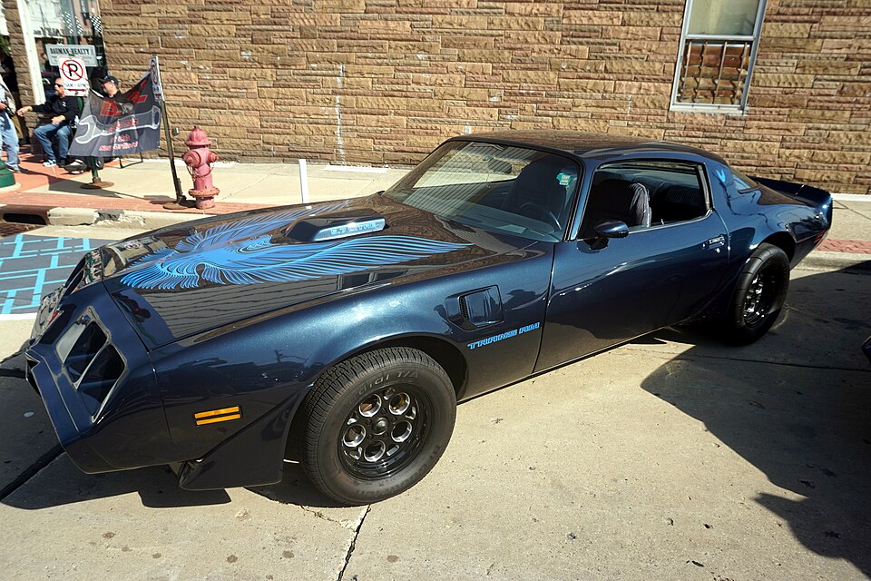 Dark blue 1979 Pontiac Firebird Trans Am with blue hood bird decal